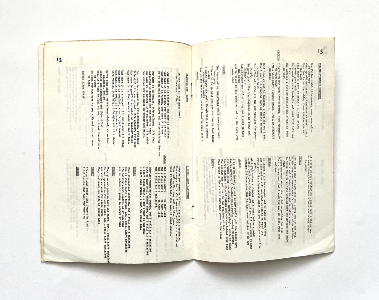 Open 1977 Women's Liberation Conference songbook with two pages of song lyrics.