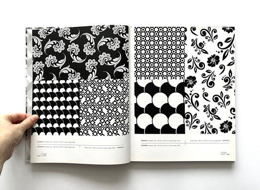 Open 'Black & White Matrix 1' book displaying black and white geometric and nature-inspired patterns.