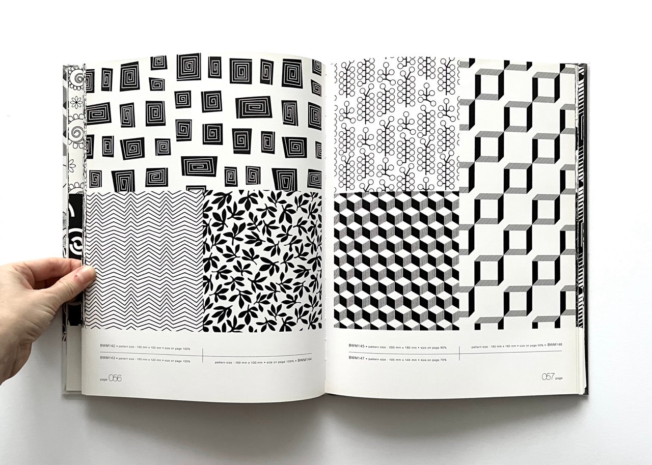 Open 'Black & White Matrix 1' book displaying black and white geometric and nature-inspired patterns.