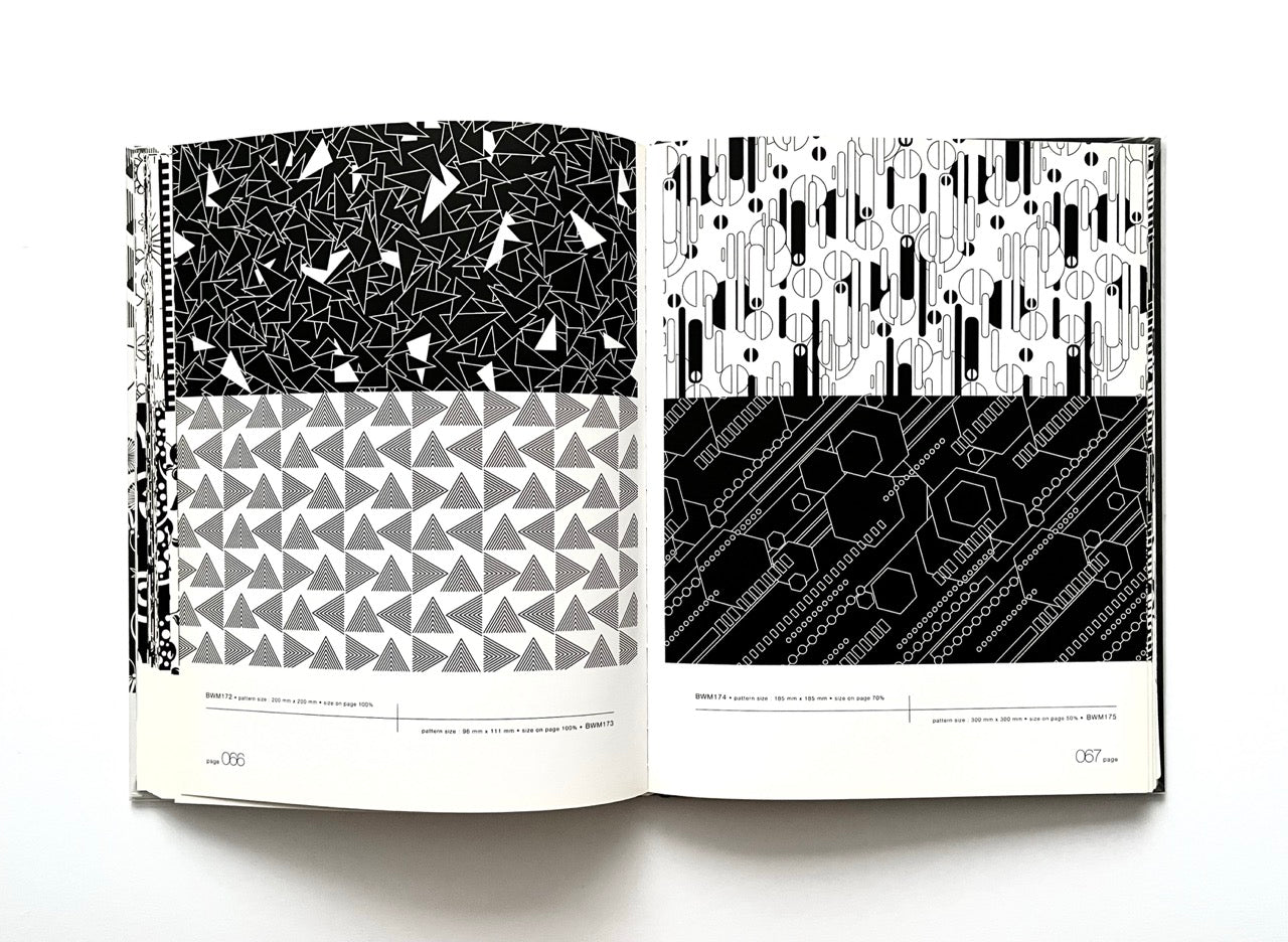 Open 'Black & White Matrix 1' book displaying black and white geometric patterns.