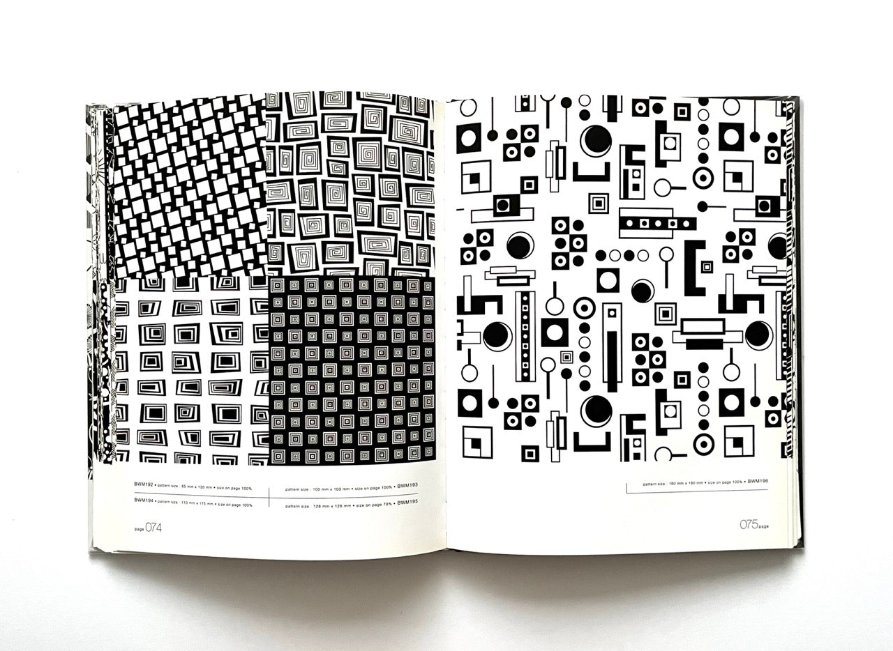 Open 'Black & White Matrix 1' book displaying black and white geometric patterns.