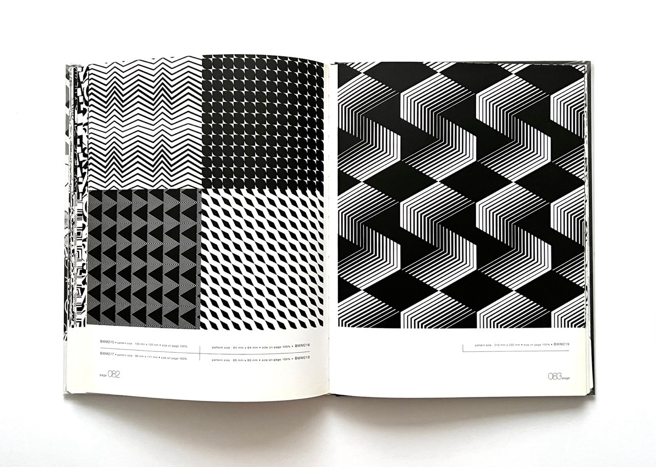 Open 'Black & White Matrix 1' book displaying black and white geometric patterns.