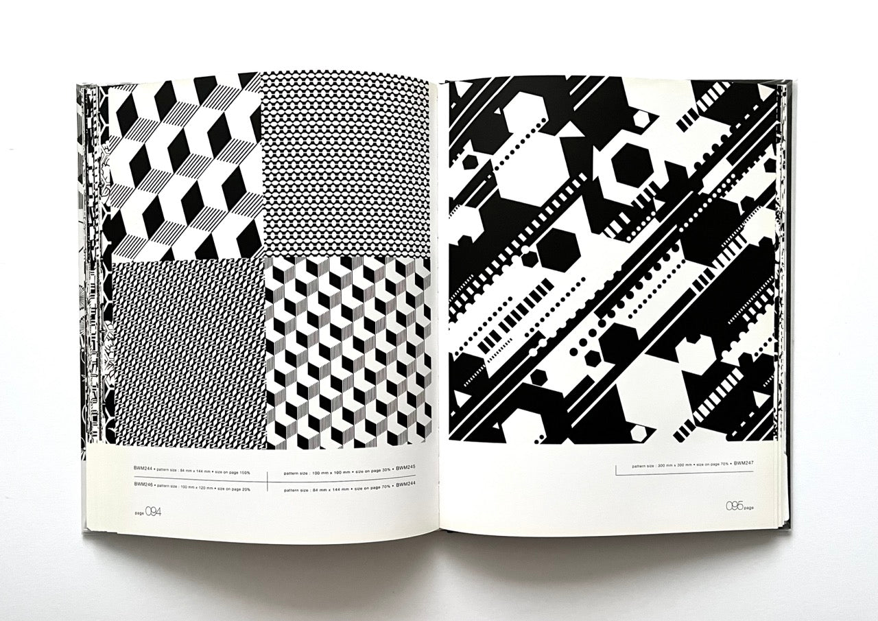 Open 'Black & White Matrix 1' book displaying black and white geometric patterns.