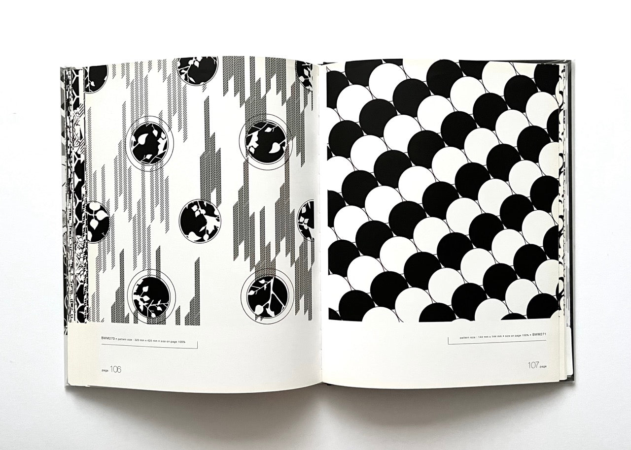 Open 'Black & White Matrix 1' book displaying black and white geometric patterns.