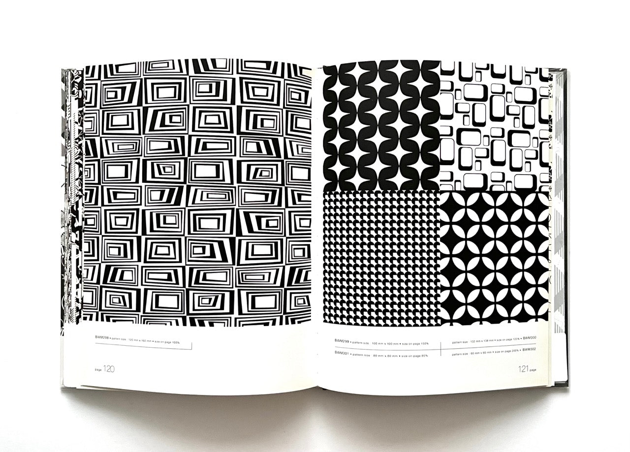 Open 'Black & White Matrix 1' book displaying black and white geometric patterns.