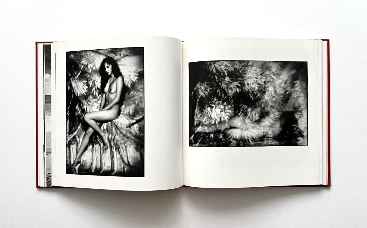 Open David Bailey's Trouble and Strife' book with black and white photographs of nude Marie Helvin.