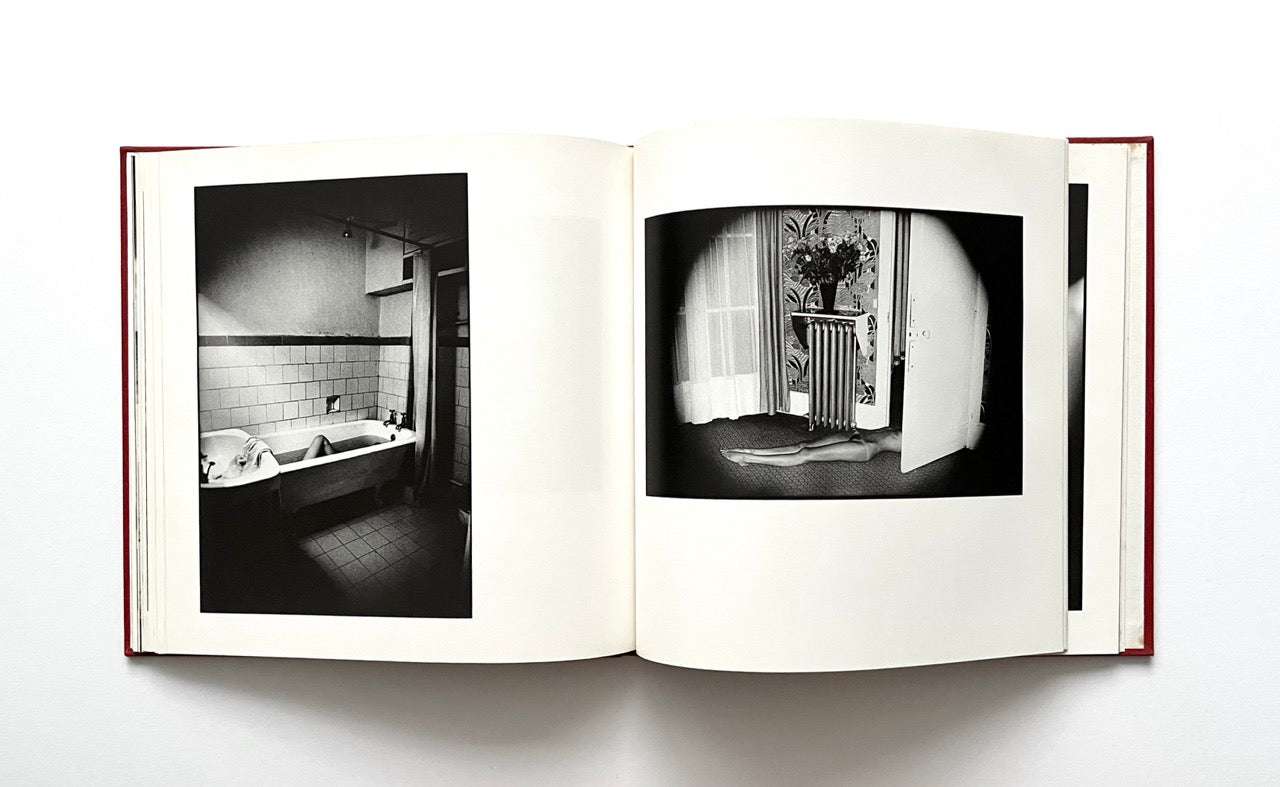 Open David Bailey's Trouble and Strife' book with black and white photographs of nude Marie Helvin.
