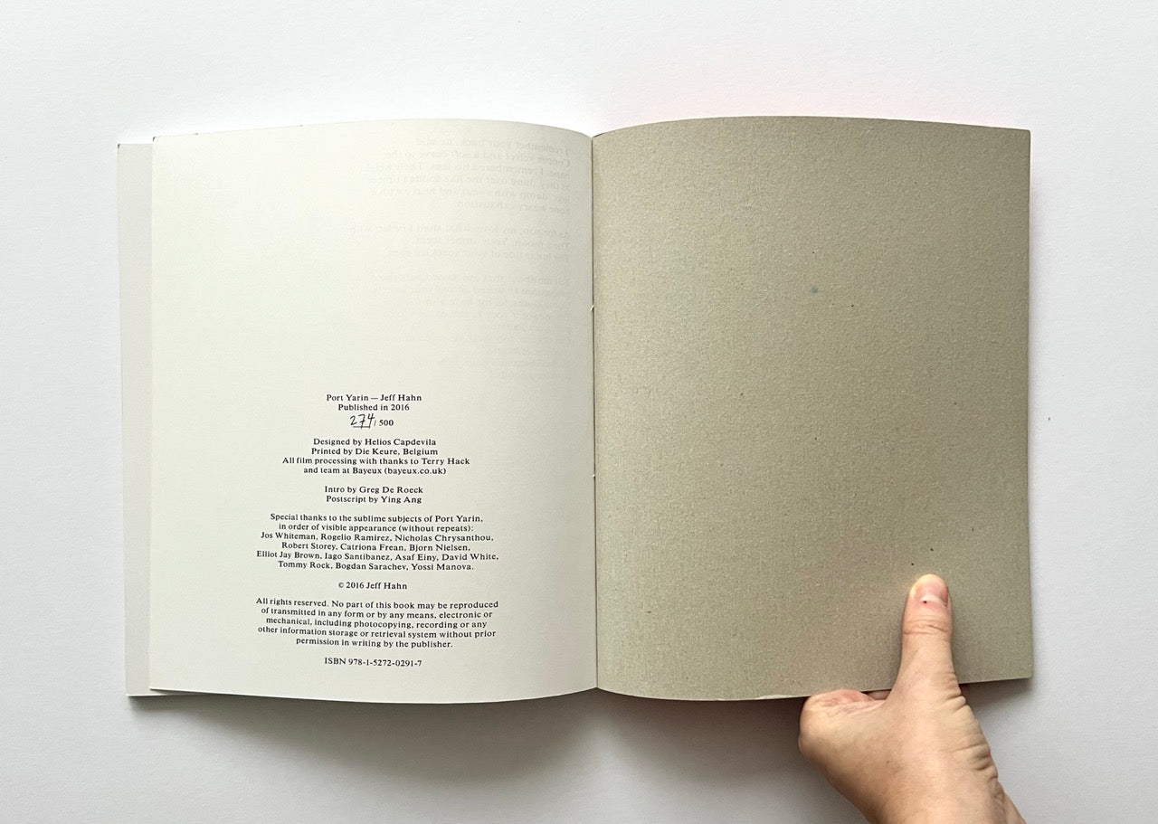 Open book showing publishing details for 'Port Yarin' by Jeff Hahn.