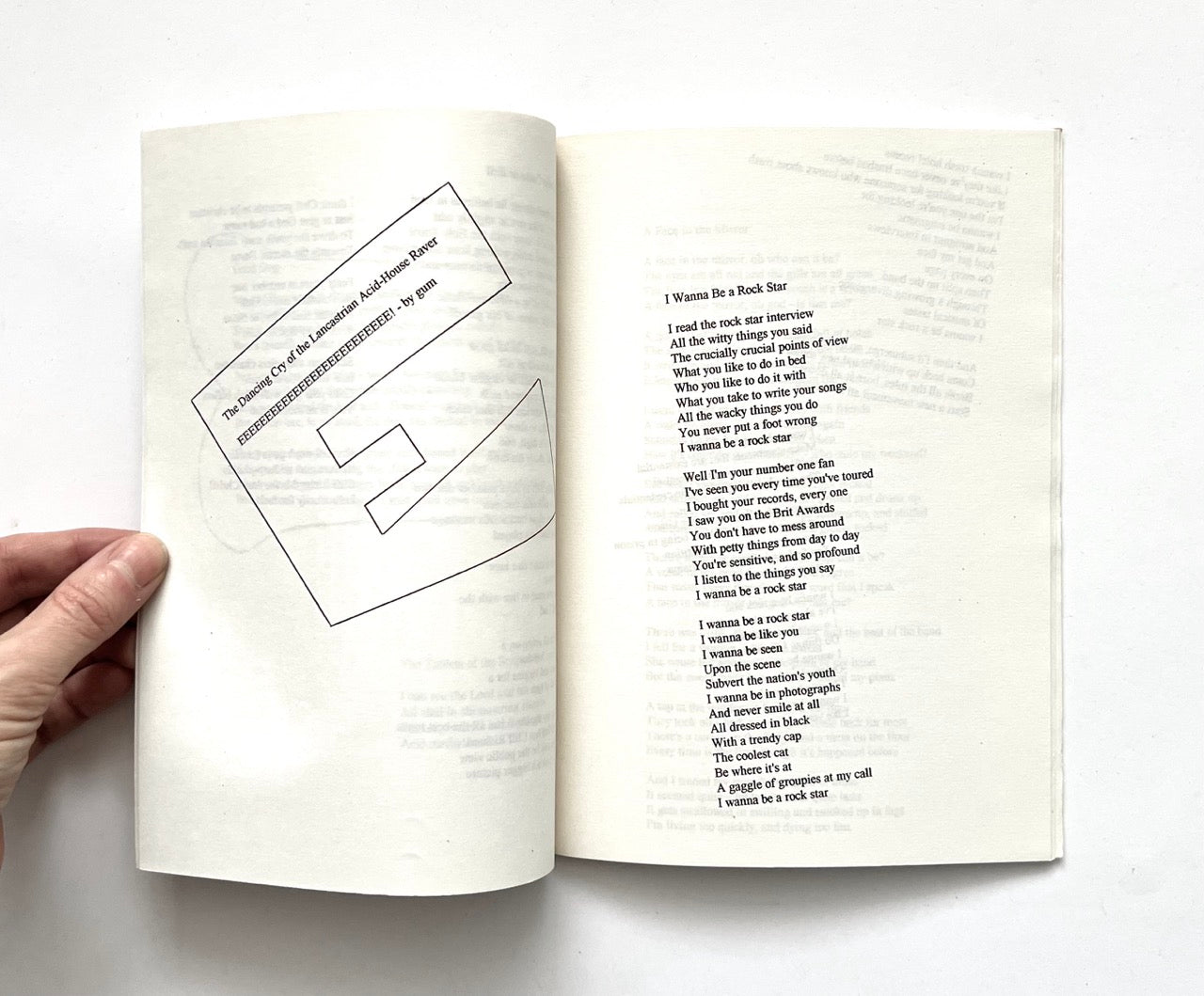 Open book: 'JOHN LENNON NEVER LIVED IN OUR HOUSE' by RICHARD ALLEN, with text on a white background