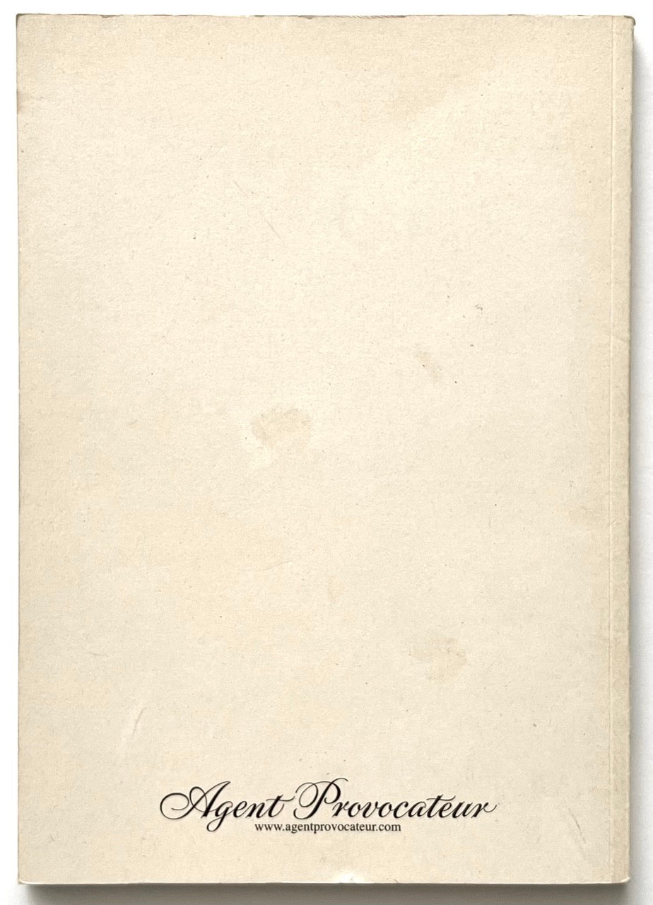 Rear book cover of 'The Lady of the Manor', with 'Agent Provocateur' branding printed at the bottom.