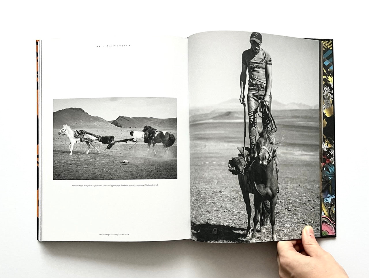 Open'The Protagonist Magazine' issue 1, showing black and white photographs of a man with horses in a desert landscape.