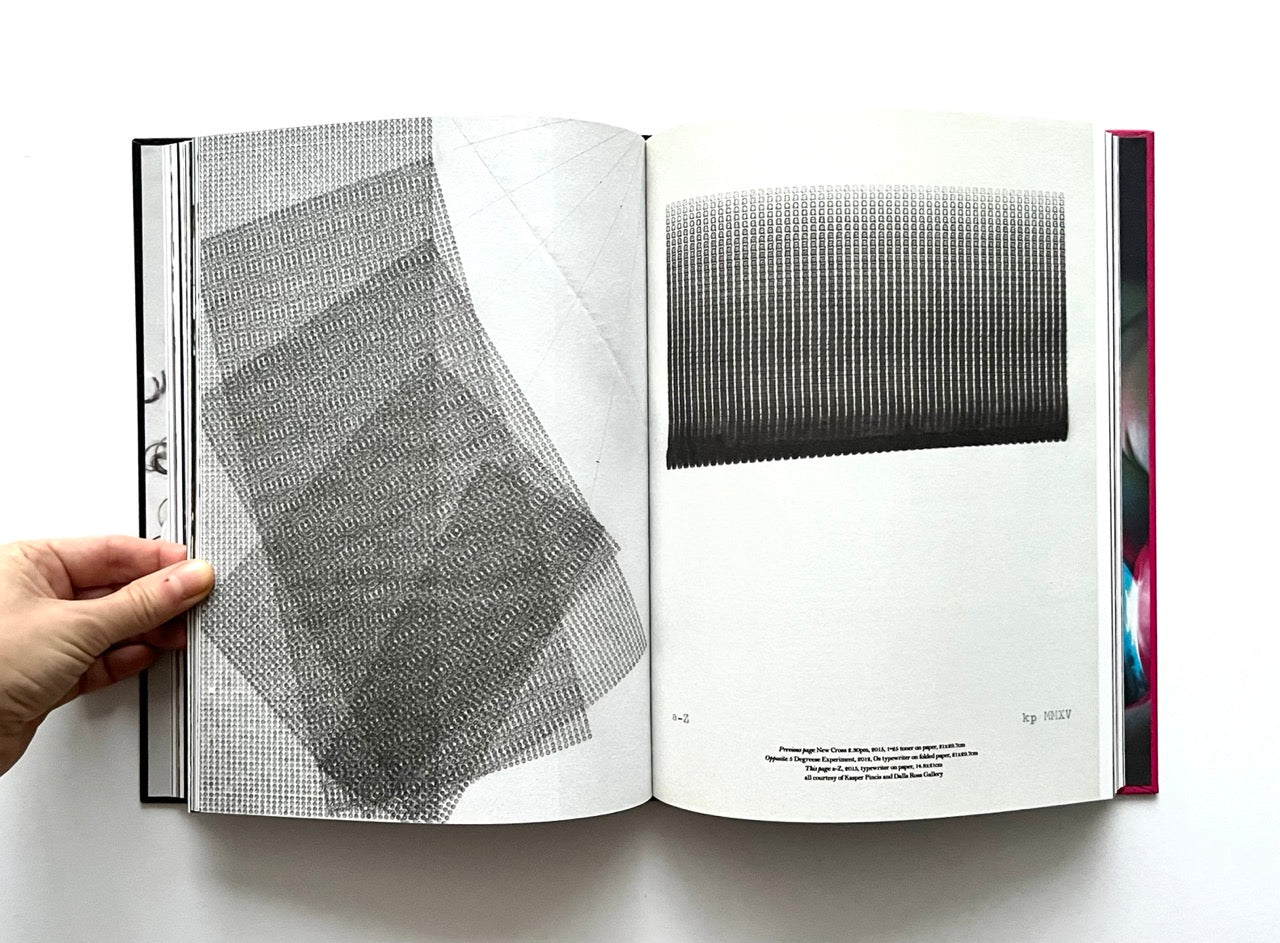 Open 'The Protagonist Magazine' issue 2, displaying black and white geometric patterns on a white background