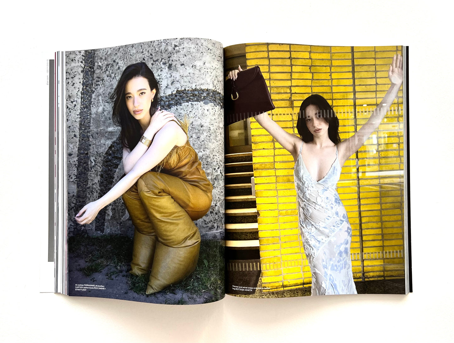 Open magazine showing two fashion photos of a woman in different poses.