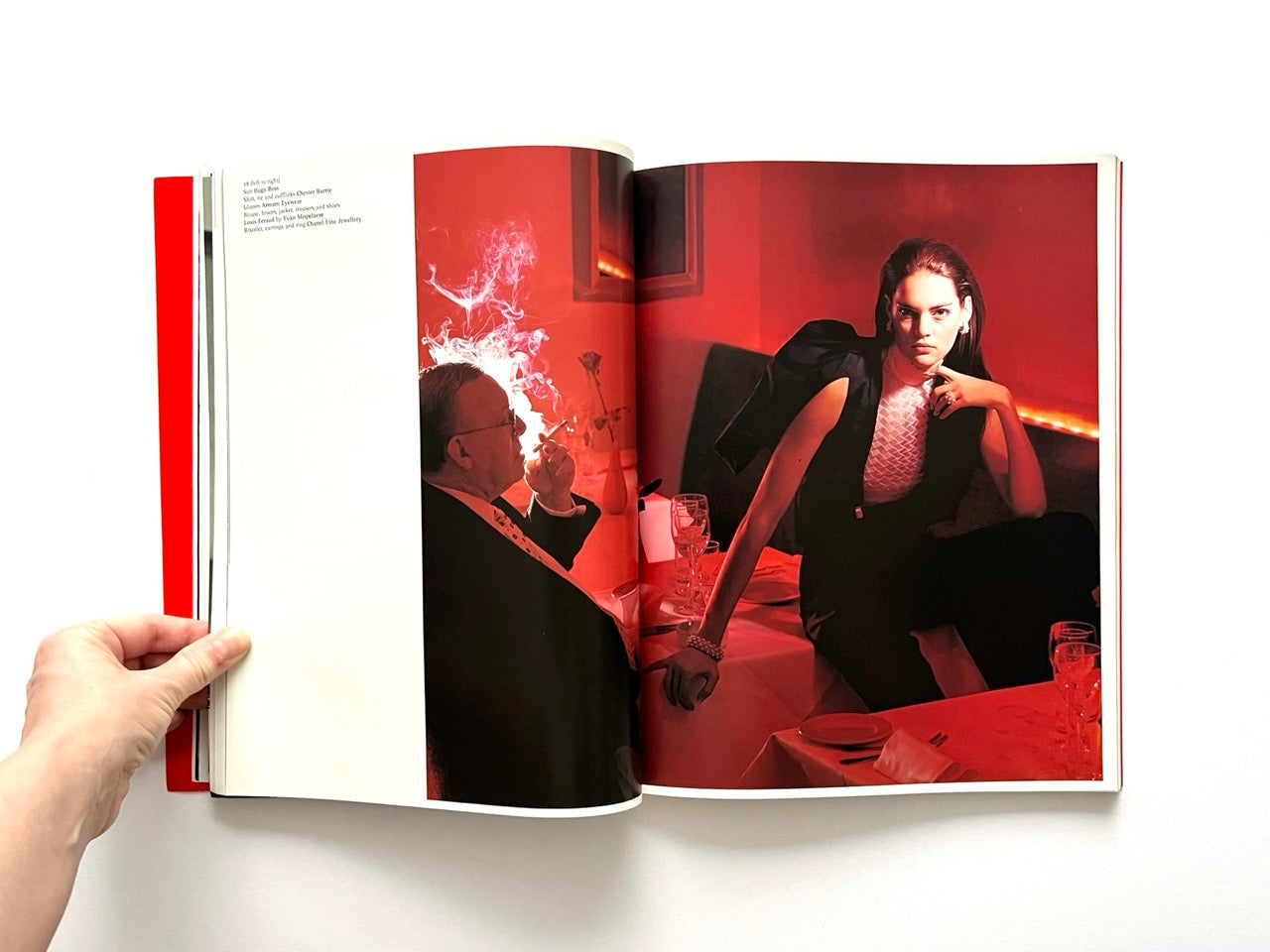 Interior spread of 10 Magazine Issue One showing a fashion editorial scene in red lighting with two figures in a restaurant setting