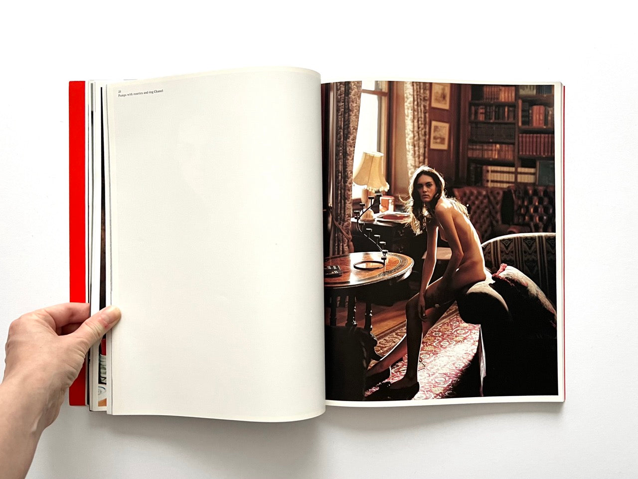 Interior spread of 10 Magazine Issue One featuring a nude model seated in a domestic interior with warm lighting
