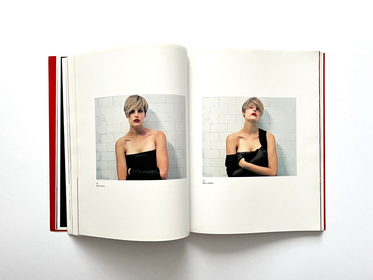 Interior spread of 10 Magazine Issue One featuring two minimal fashion portraits of a model against a tiled wall