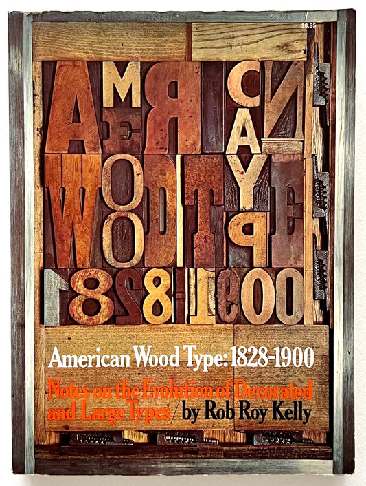 Book cover with wooden letters and text 'American Wood Type: 1828-1900' by Rob Roy Kelly.