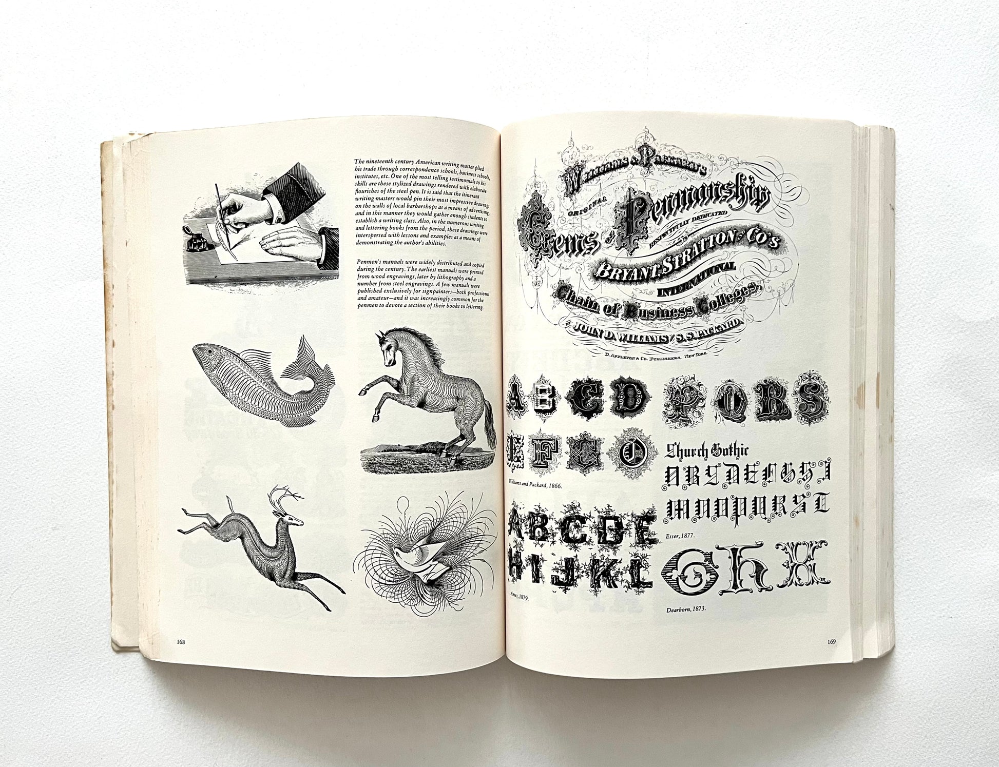 Open book displaying vintage illustrations and text on a white background