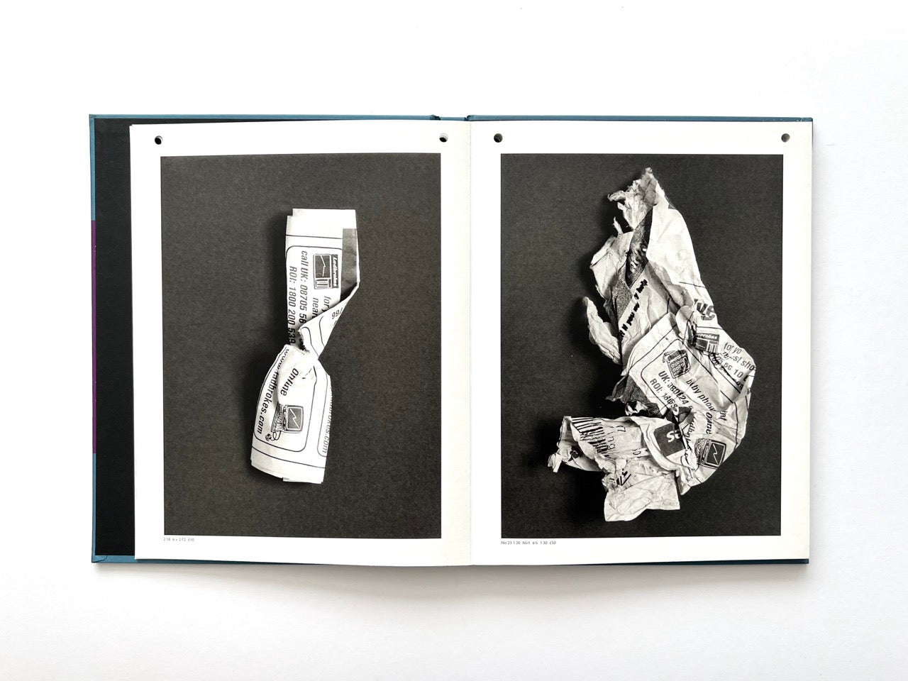 Interior spread from A Series of Disappointments (2008) by Stephen Gill, featuring discarded betting slips  against dark backgrounds.