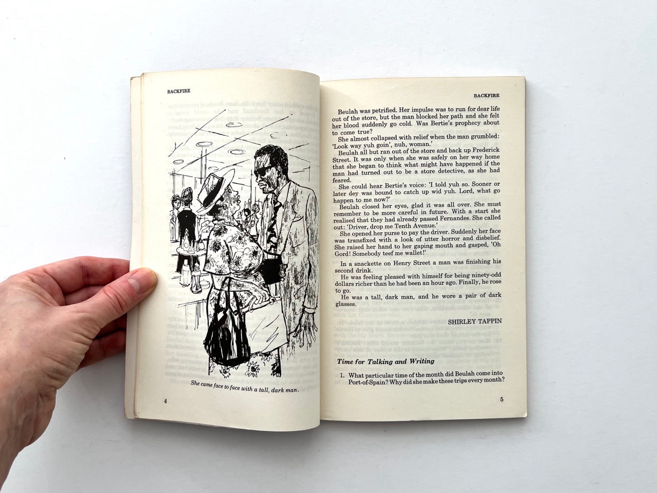 Interior spread from Backfire showing short story text with black and white line illustration of street scene