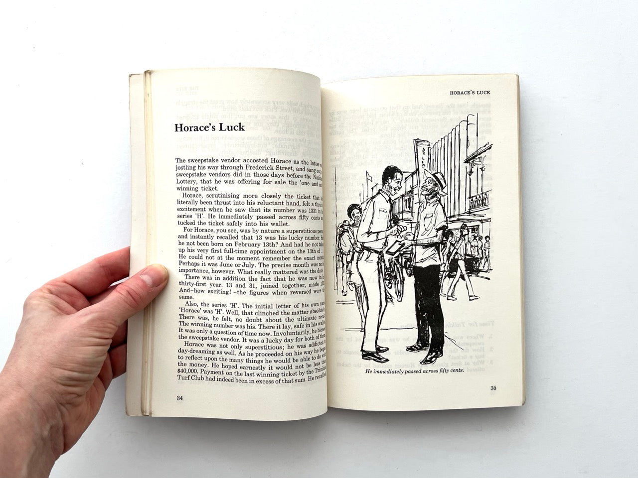 Interior spread from Backfire showing story text with black and white illustration of two men talking in street