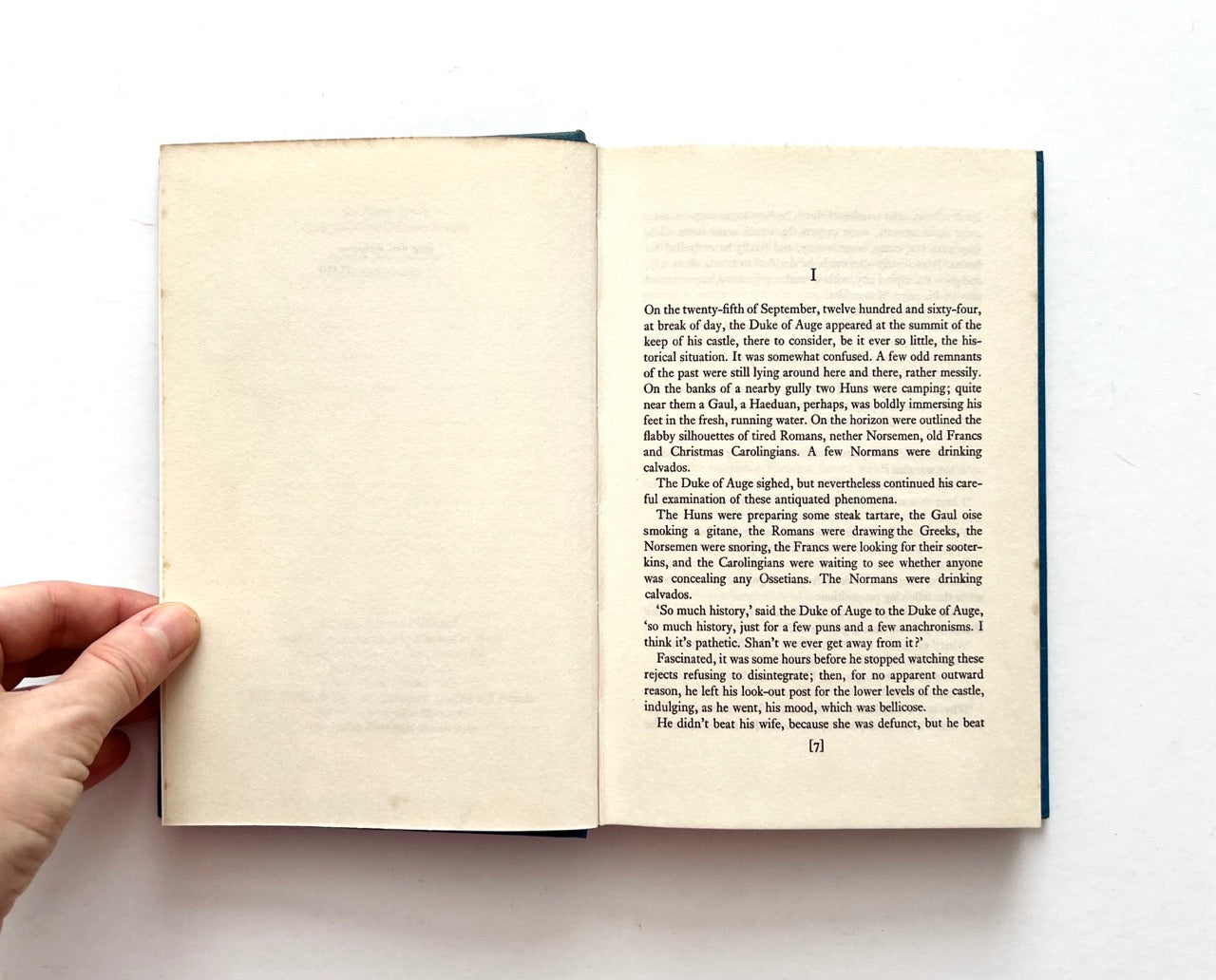 Opening page of Between Blue and Blue by Raymond Queneau, first UK edition published in 1967, showing the beginning of the novel in a clean, well-preserved interior.