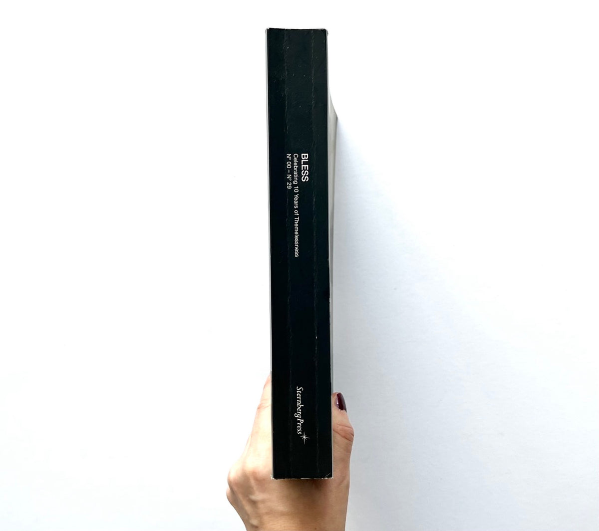 BLESS: Celebrating 10 Years of Themelessness, N° 00–N° 29 by Désirée Heiss and Ines Kaag, 2006. Black book spine with white title lettering and Sternberg Press publisher's logo.