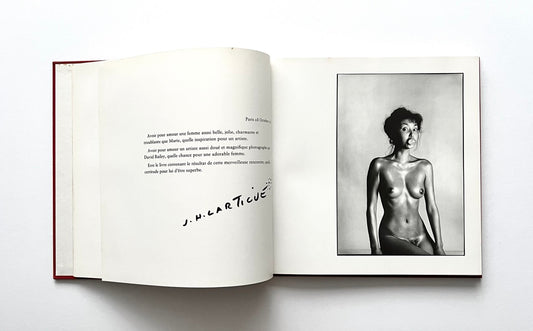Open David Bailey's Trouble and Strife' book with a black and white photograph of nude Marie Helvin.