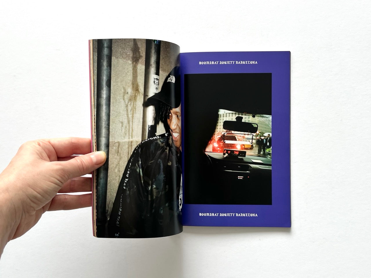 Doomsday Society Issue No. 01 – Interior spread featuring portrait of a person in streetwear and a photograph taken from inside a car, captioned Doomsday Society Barcelona.