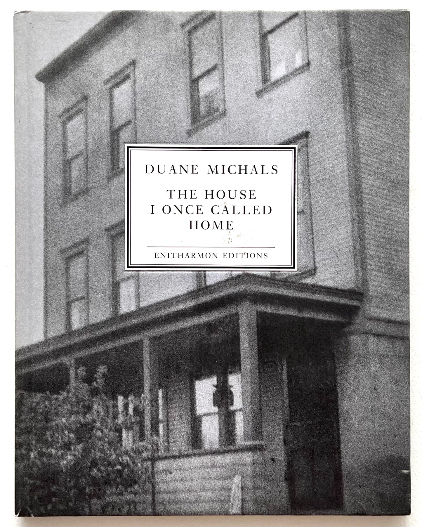 Book cover of 'The House I Once Called Home' by Duane Michals with a black and white photograph of a house.