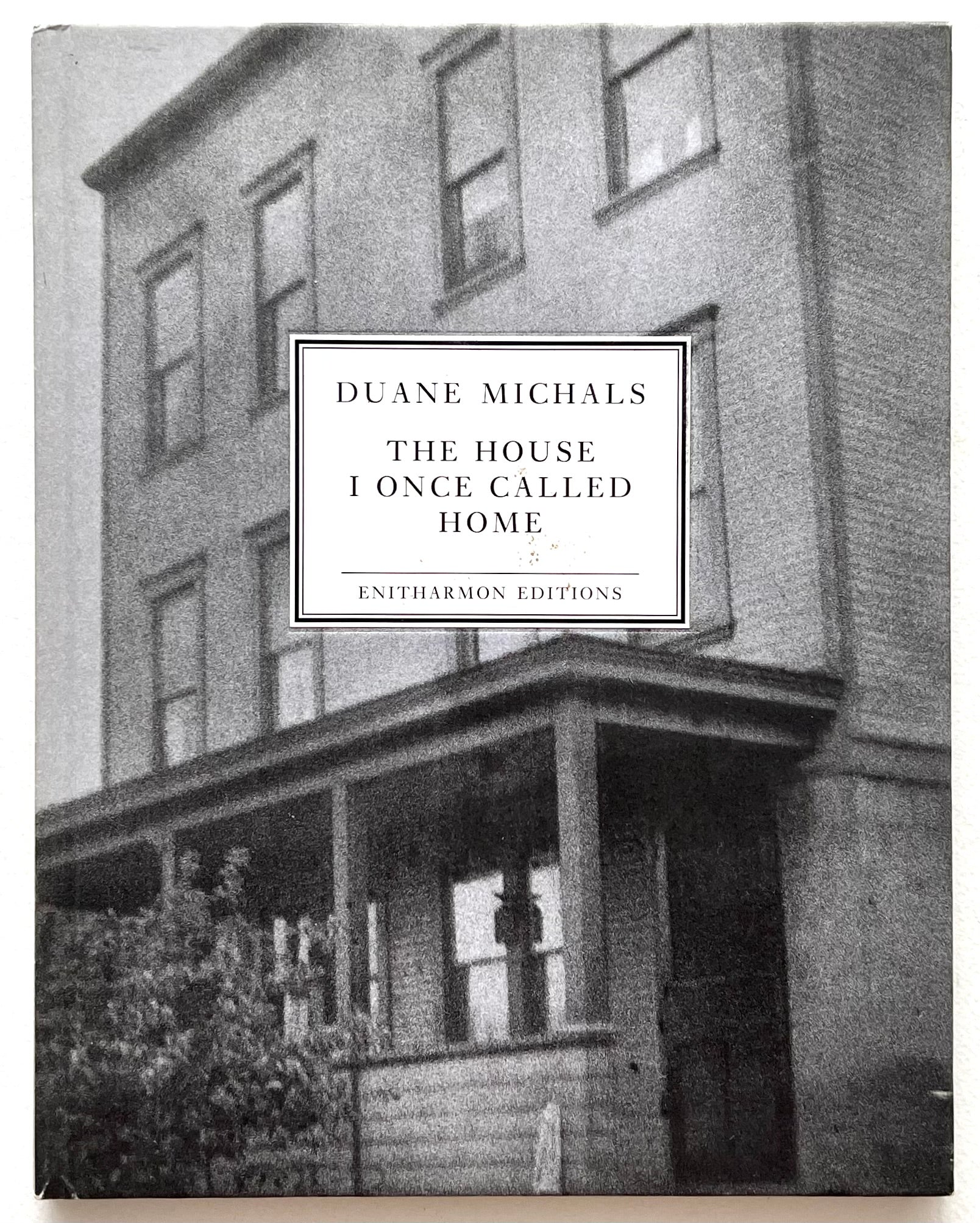 Book cover of 'The House I Once Called Home' by Duane Michals with a black and white photograph of a house.