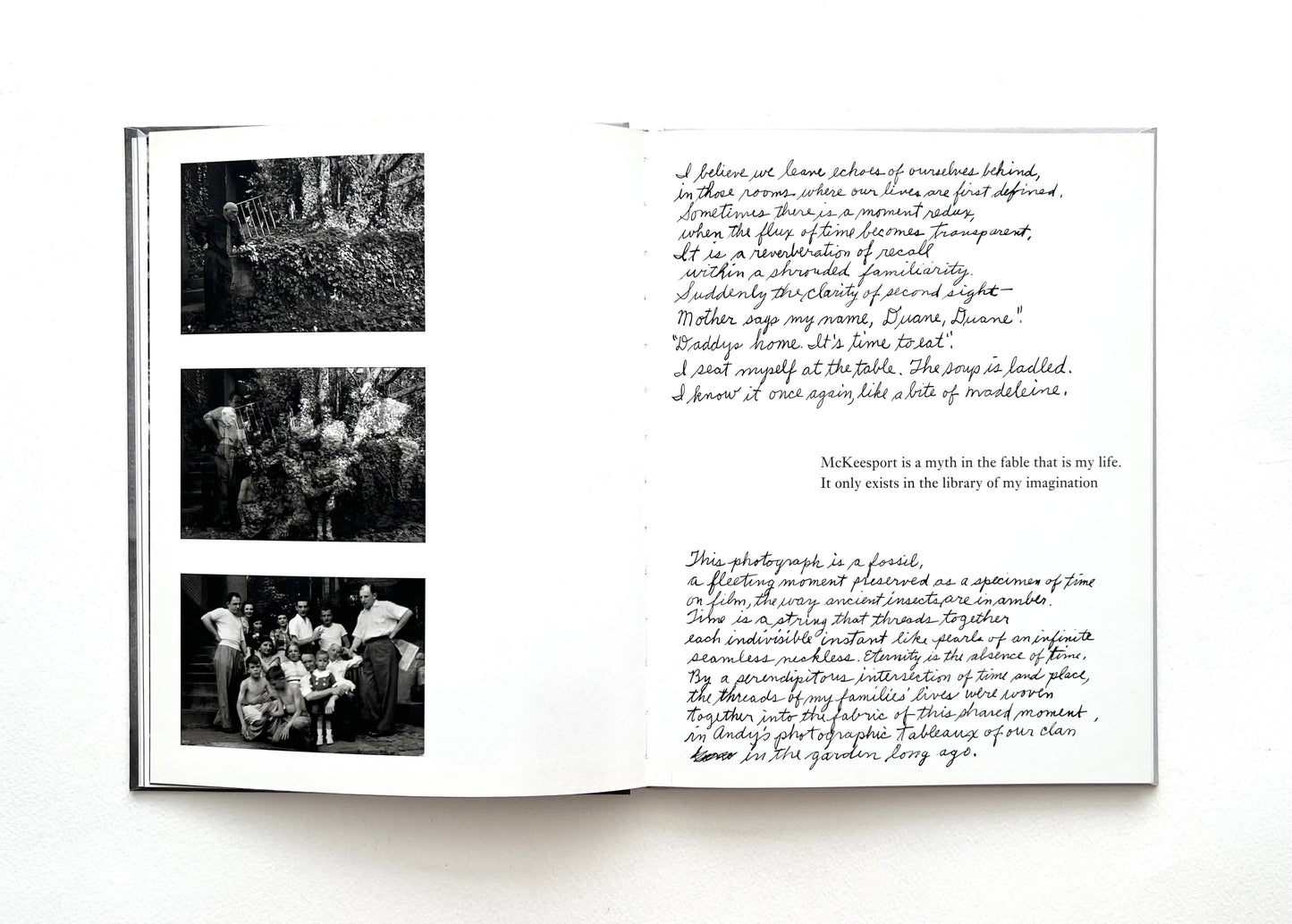 Open book with black and white photographs and hand-written text by Duane Michals on a white background