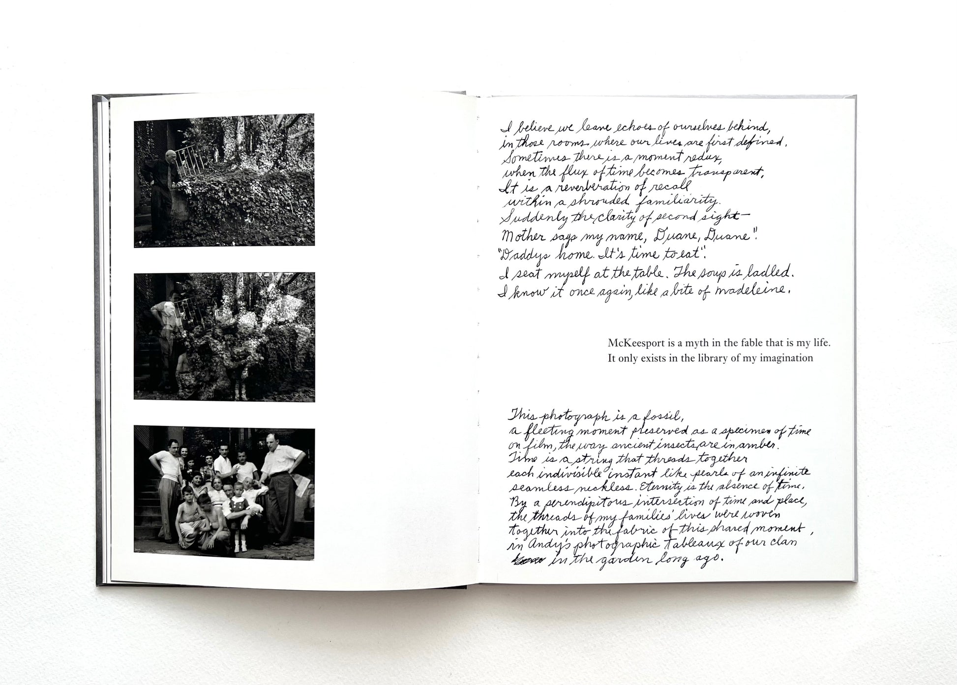 Open book with black and white photographs and hand-written text by Duane Michals on a white background