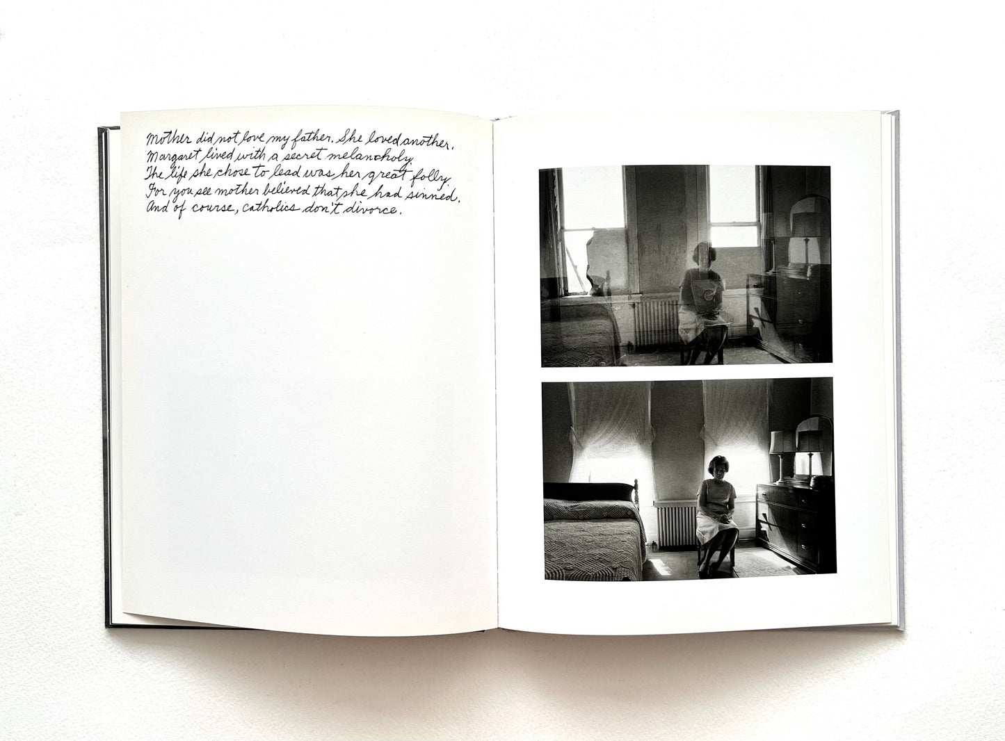 Open book with black and white photographs of a woman sitting on a chair and text on a white background