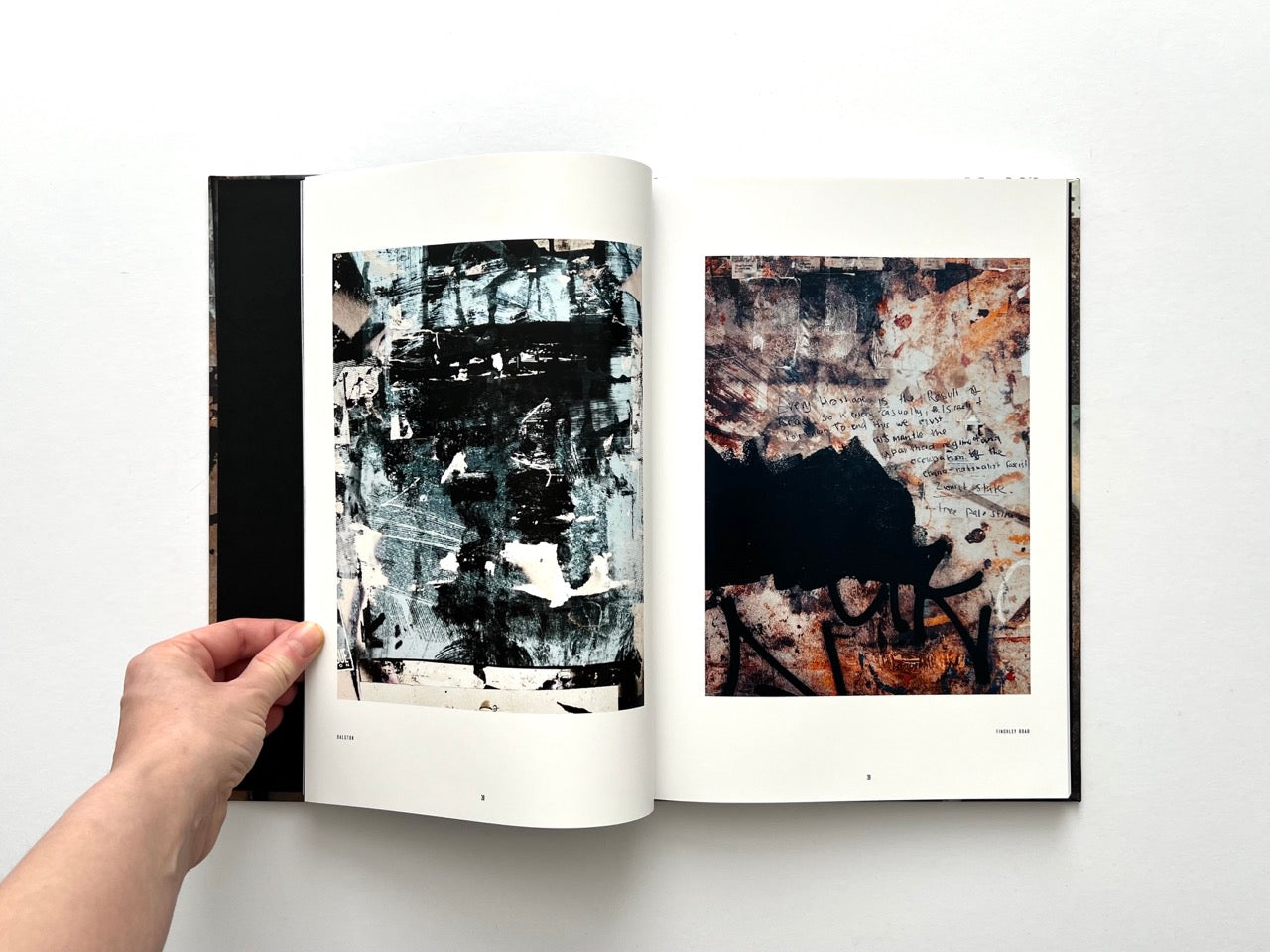 Interior spread from Dubious Splendor: Graphic Works by Rob Sanders 2023–2024 with dark abstract works incorporating handwritten marks and collage
