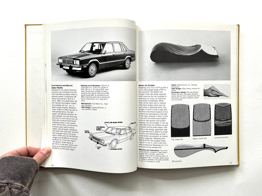 Open book showing black and white images of cars and design elements. Design Review Industrial Design 24th Annual 1978.