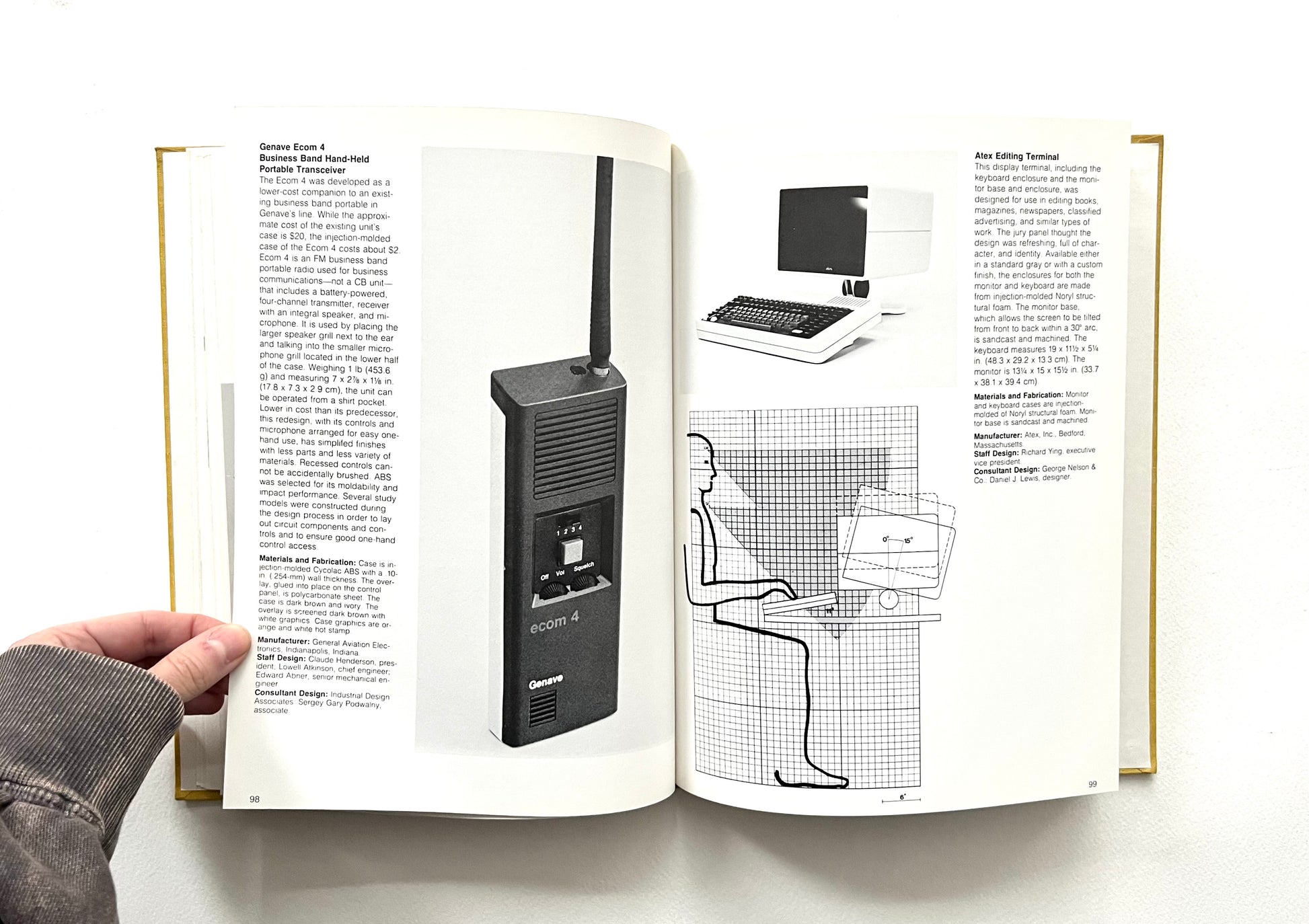 Open book with a black 1970s electronic device illustration on a white background