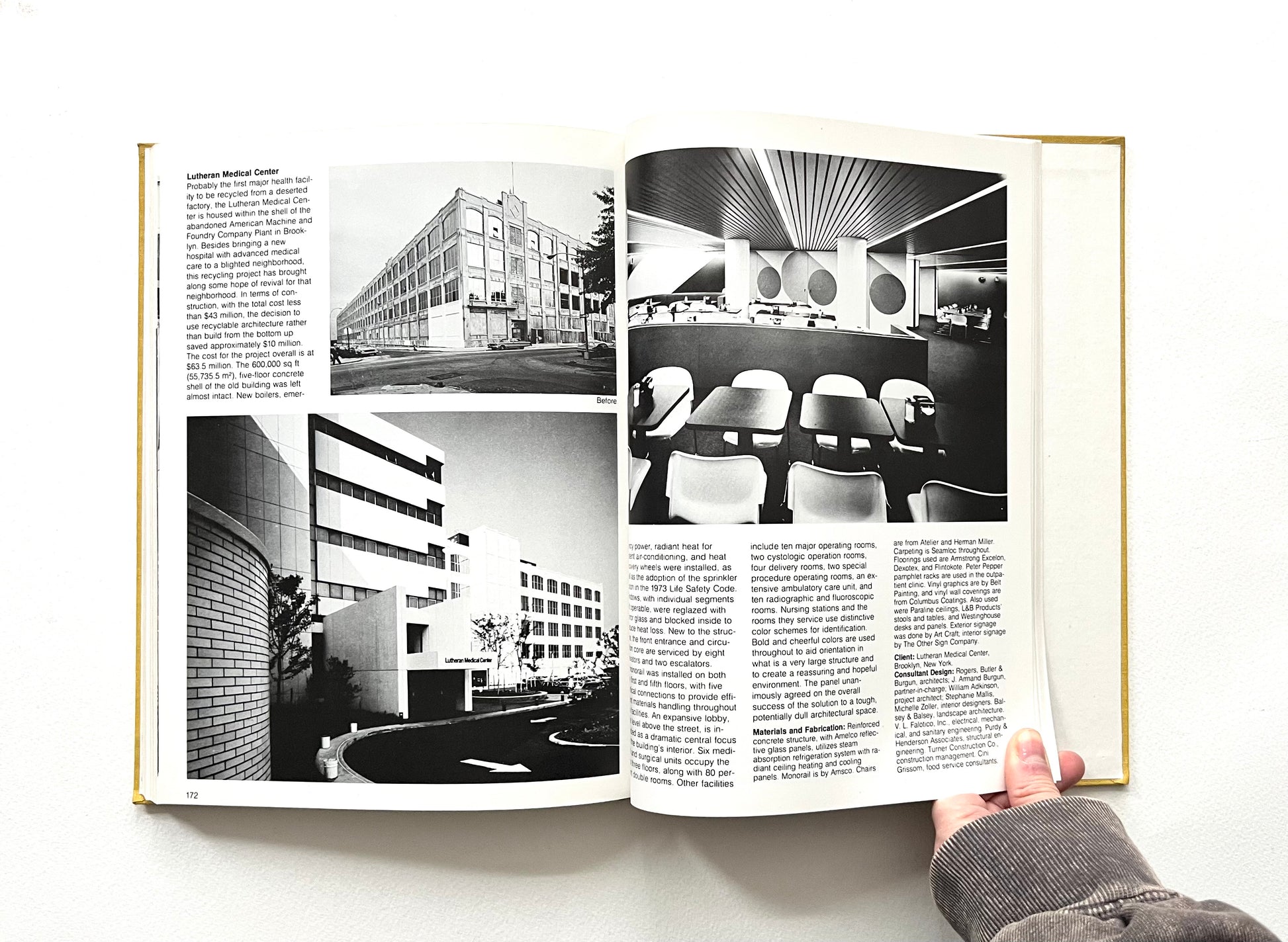 Open book showing black and white architectural photographs and text on a white background  Design Review Industrial Design 24th Annual 1978.