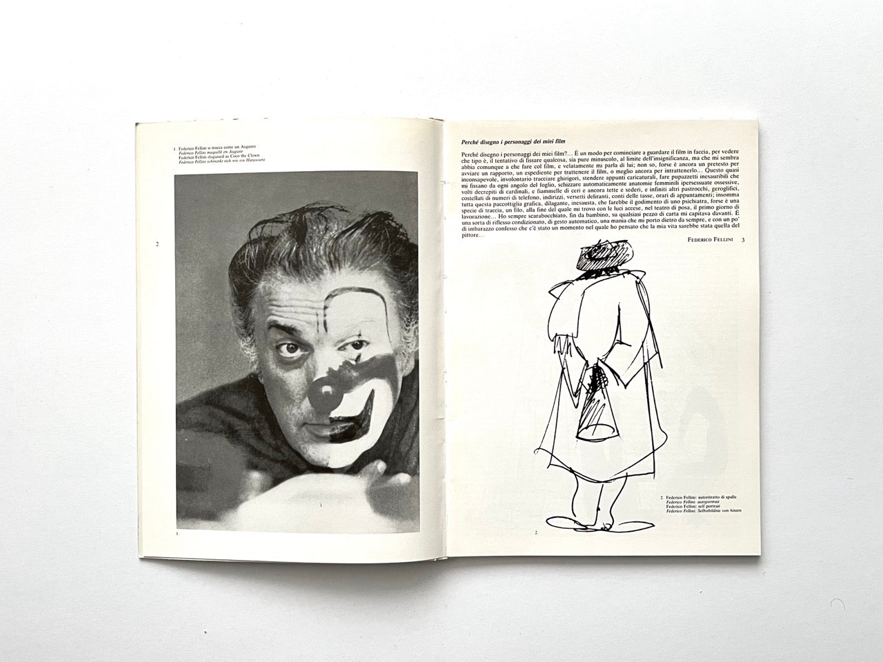 Interior spread showing a black-and-white portrait of Federico Fellini with clown-like painted lines across his face on the left page. Right page features Italian text and a loose black-ink sketch of a figure in an overcoat, viewed from behind