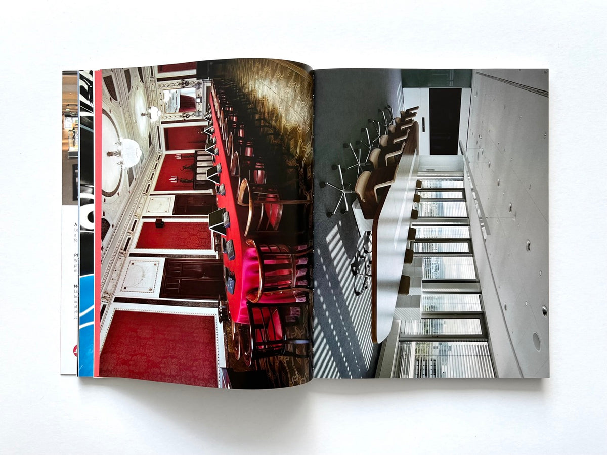 FOAM International Photography Magazine, Issue #35: Lust, Summer 2013. Interior double-page spread juxtaposing an ornate red historical conference room with a long table and chandeliers against a minimalist modern boardroom with panoramic windows.
