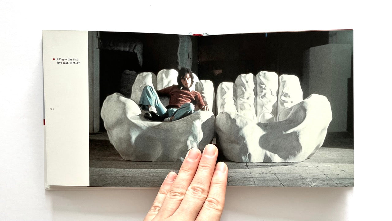 Book open - GAETANO PESCE
by Marisa Bartolucci -  showing a person sitting on a unique hand-shaped chair.