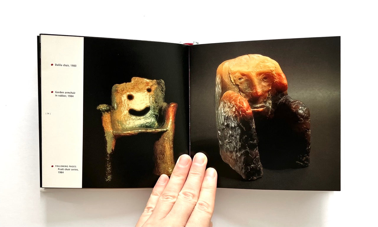 Open book - GAETANO PESCE
by Marisa Bartolucci - showing whimsical chair designs with faces sculptured into them.