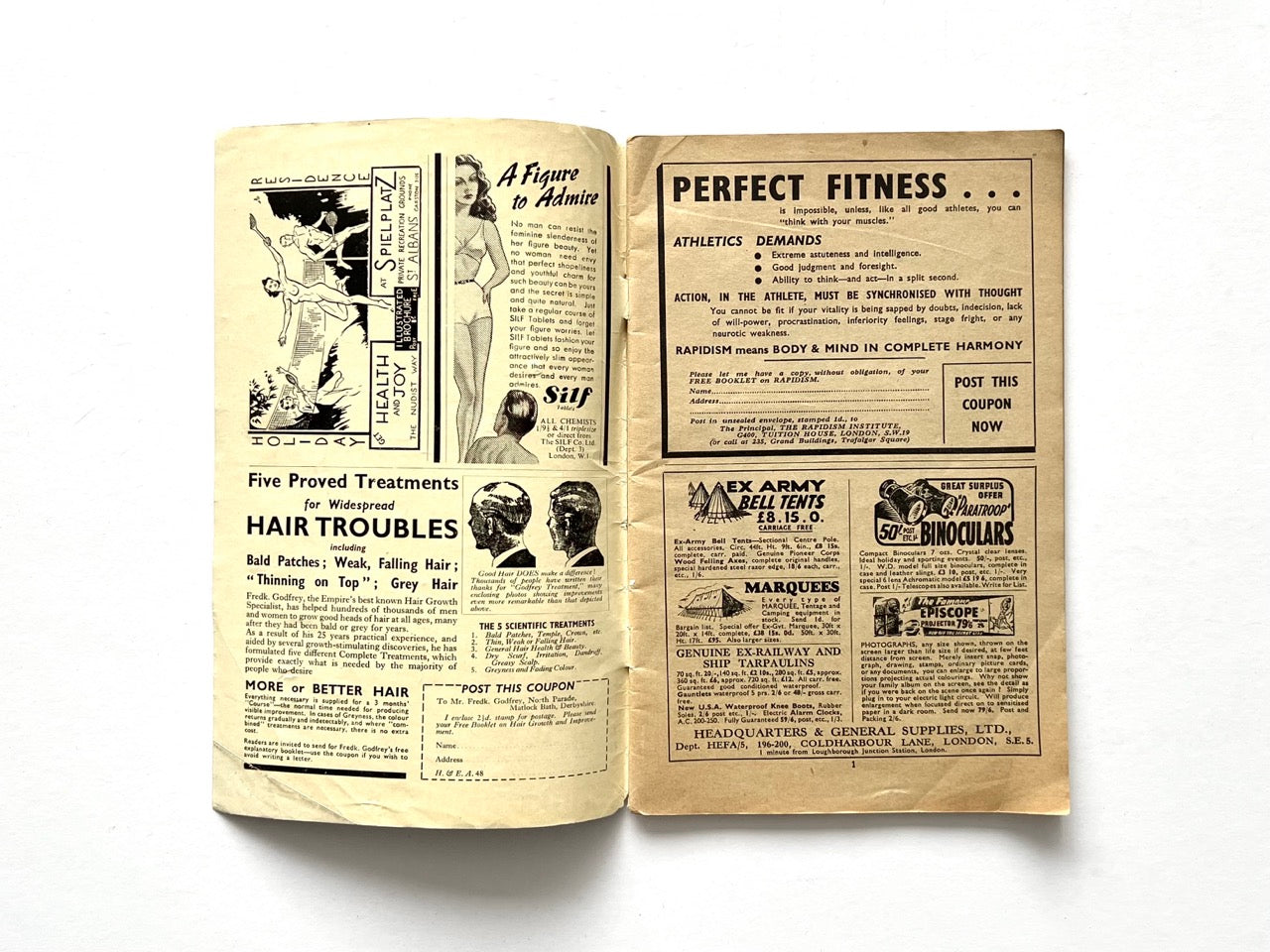 Health and Efficiency Summer Annual, 1948. Interior double-page spread of vintage British naturist magazine featuring mid-century advertisements for fitness, hair restoration, beauty products, binoculars, and mail-order goods with illustrated graphics and typography.