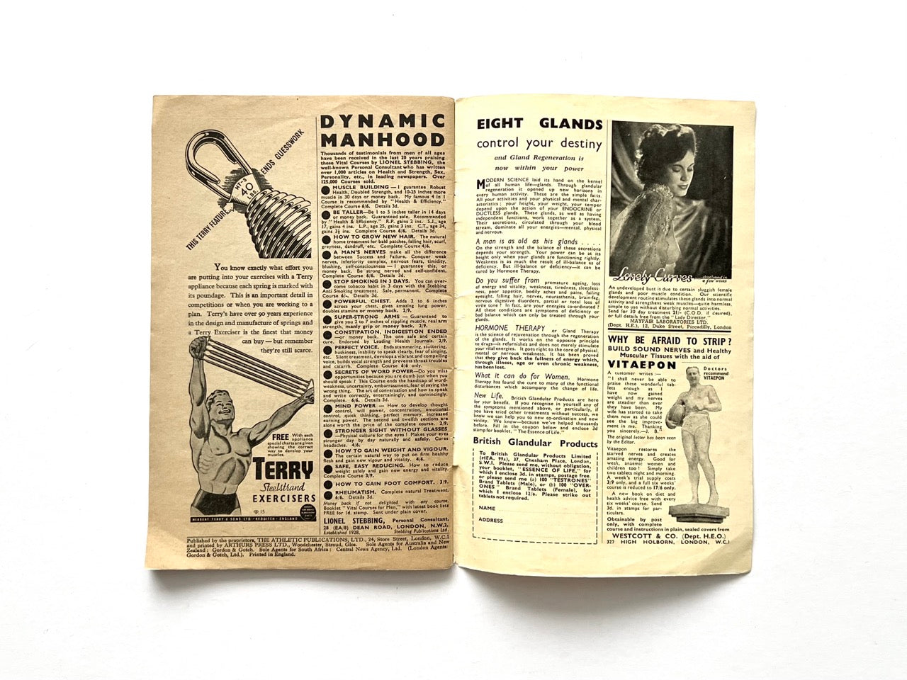 Health and Efficiency Summer Annual, 1948. Interior advertising spread featuring illustrated mid-century adverts for bodybuilding equipment, gland therapy, “dynamic manhood,” vitality cures, and physical culture products with dense period typography and retro graphic design.