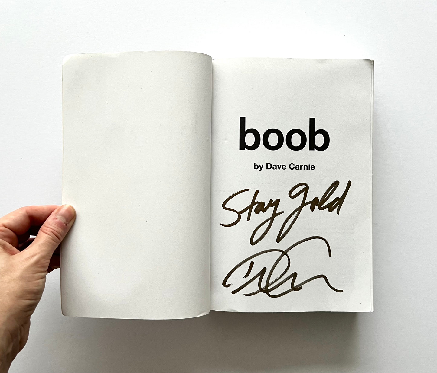 Title page of “boob” by Dave Carnie, signed with the message “Stay Gold” and the author’s signature.