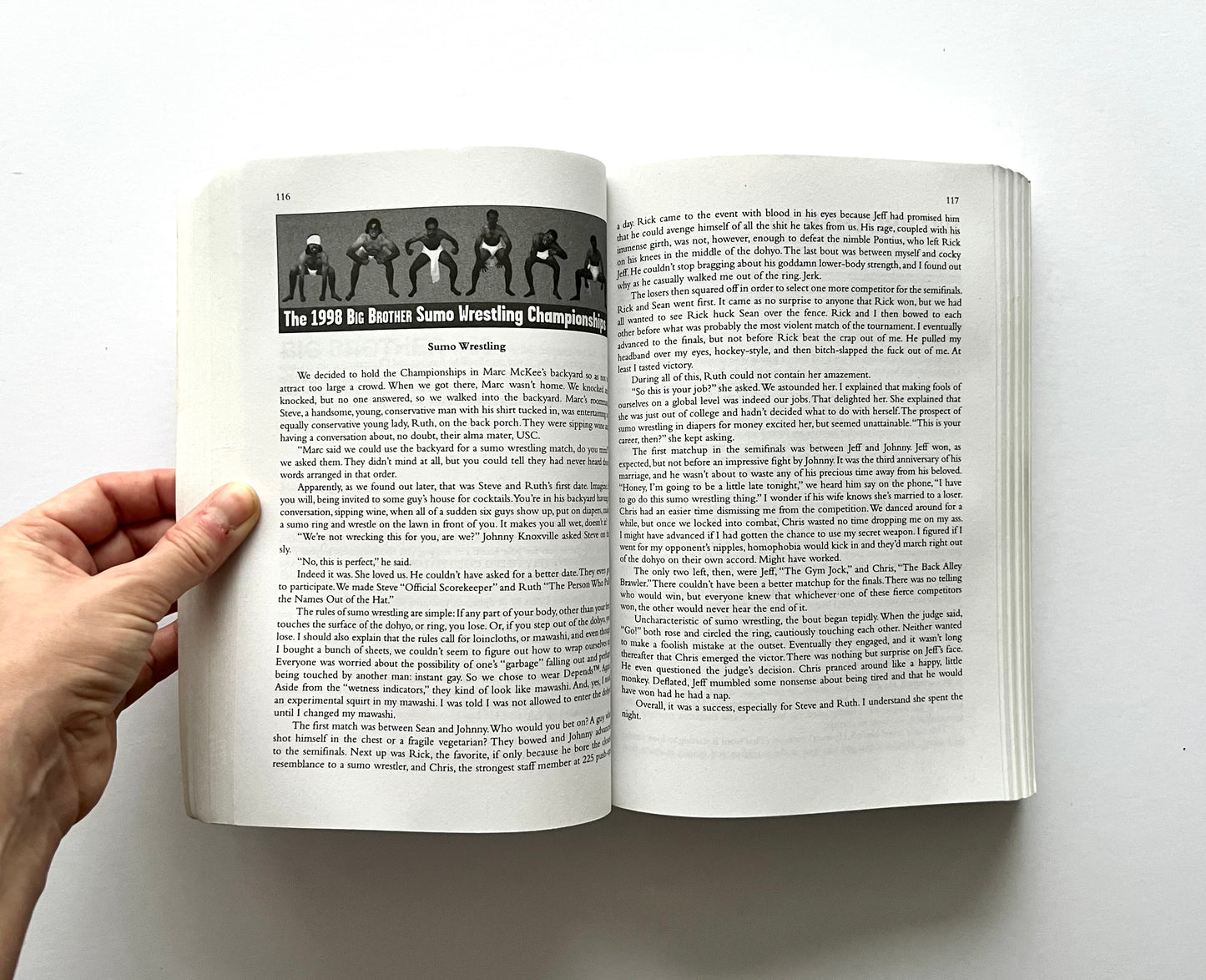 Open book showing interior pages from “boob” by Dave Carnie, featuring a section titled “The 1998 Big Brother Sumo Wrestling Championships” with a black-and-white photo of participants on page 116, and continued text on page 117.