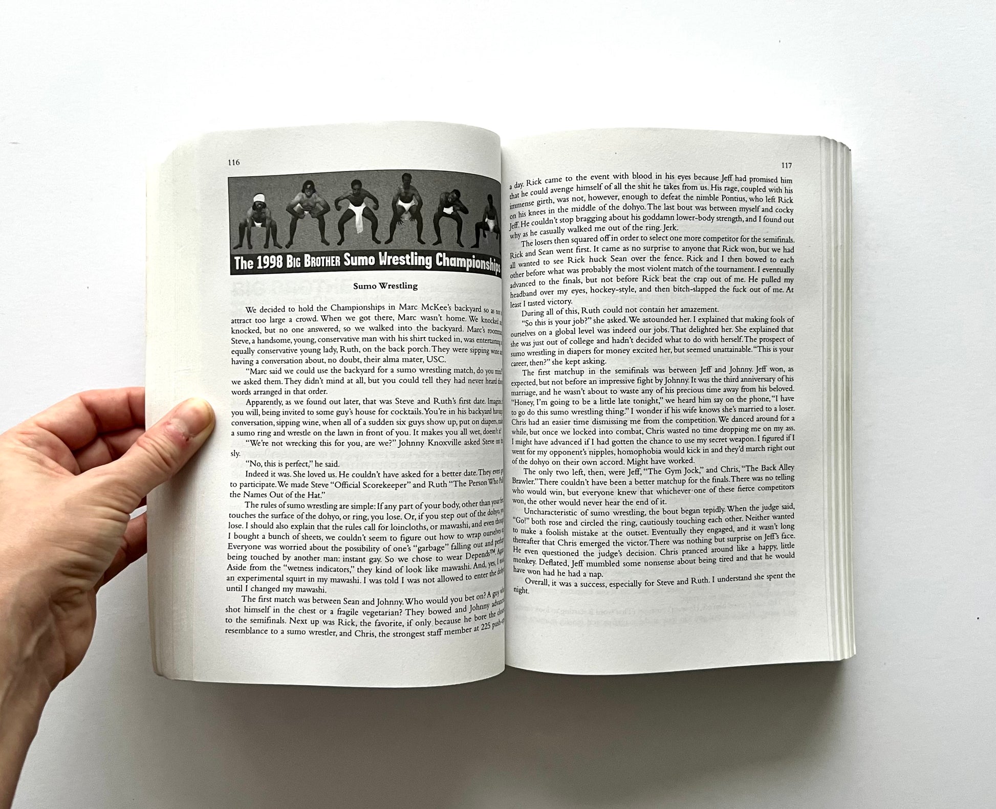Open book showing interior pages from “boob” by Dave Carnie, featuring a section titled “The 1998 Big Brother Sumo Wrestling Championships” with a black-and-white photo of participants on page 116, and continued text on page 117.