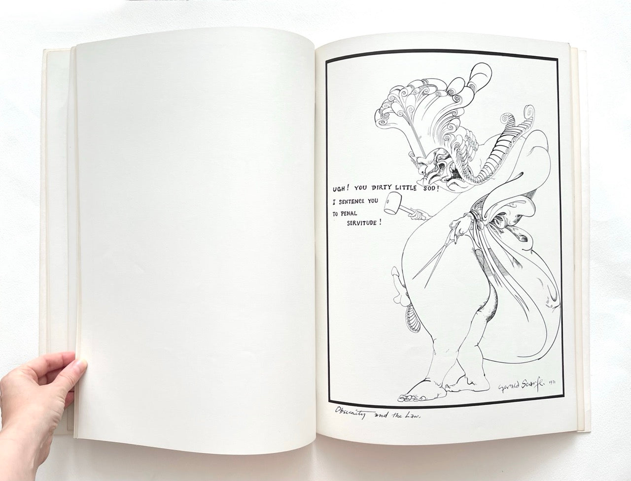 Open book - 'Indecent Exposure' by Gerald Scarfe - with black and white grotesque illustrations on a white background.