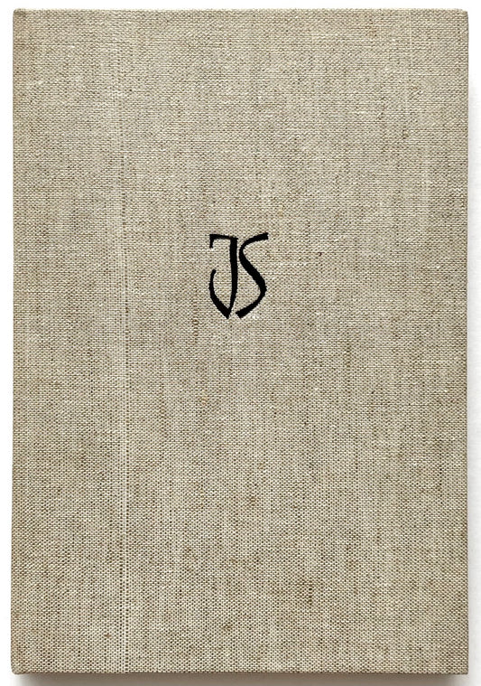 John Skelton: A Sculptor's Work 1950–1975 (1975). Front cover of the hardcover book, bound in textured natural-coloured cloth with a small black stylised “JS” monogram centred on the front cover.