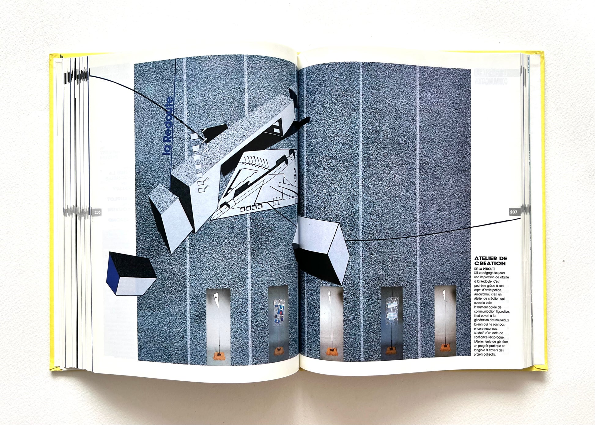 Open book -LE TEMPS DES CREATEURS [1987] showing futuristic design illustration.